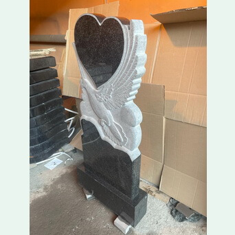 Памятник гранитный резной голубь с сердцем 